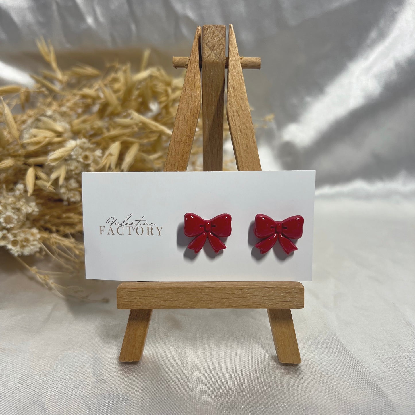 Collection de Noël -Puces « noeud glossy » voir coloris