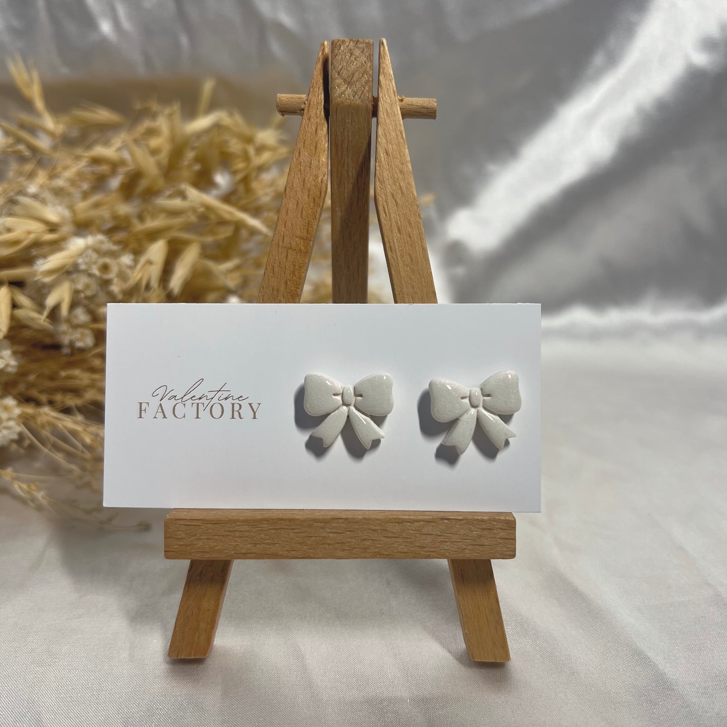 Collection de Noël -Puces « noeud glossy » voir coloris